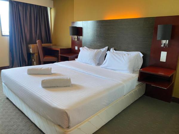 COZY Studio at Ming Garden Residence : photo 5 de la chambre studio lit king-size