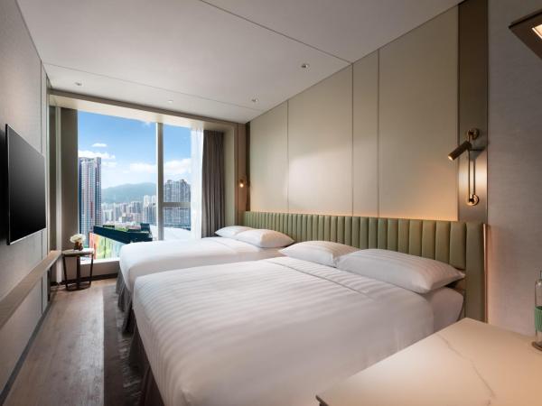 Dorsett Kai Tak : photo 1 de la chambre premier family quad room