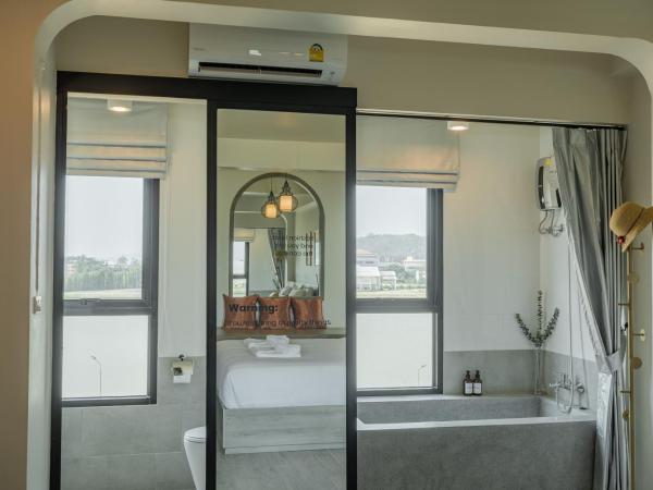Ang Pao Hotel - SHA Extra Plus : photo 7 de la chambre chambre lit king-size avec vue
