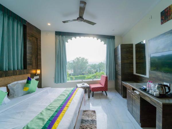 Treebo The Aravali Getaway : photo 2 de la chambre chambre double deluxe