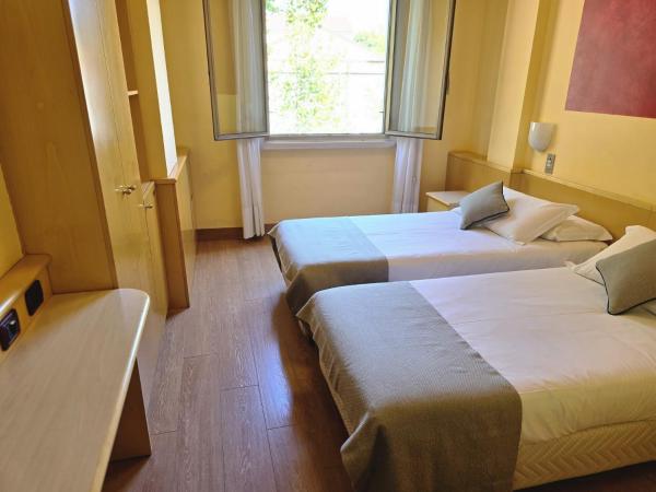 Mokinba Hotels Sant'Ambroeus : photo 4 de la chambre chambre lits jumeaux