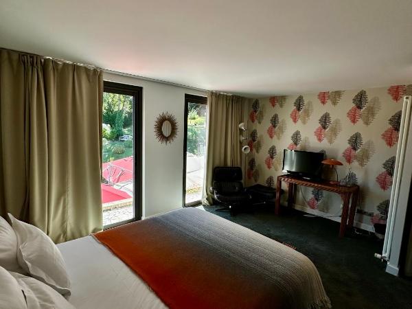 Le Clos Jeannon : photo 4 de la chambre suite junior - vue sur jardin