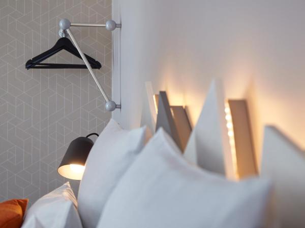 Holiday Inn - the niu, Hub Dusseldorf Messe, an IHG Hotel : photo 1 de la chambre chambre lit queen-size premium