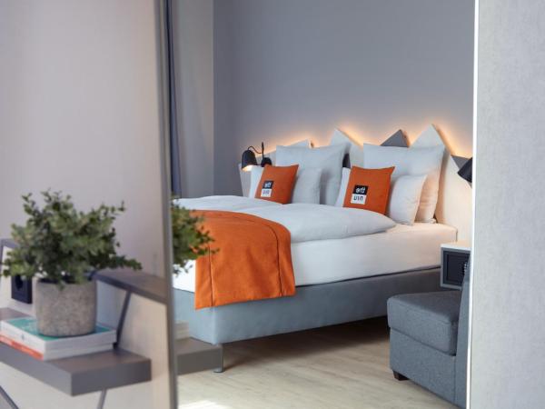 Holiday Inn - the niu, Hub Dusseldorf Messe, an IHG Hotel : photo 3 de la chambre chambre lit queen-size premium