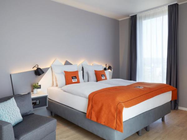 Holiday Inn - the niu, Hub Dusseldorf Messe, an IHG Hotel : photo 5 de la chambre chambre lit queen-size premium