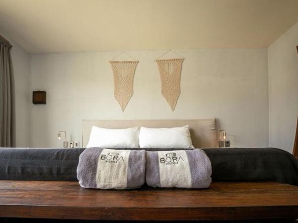 Bora Boutique - Adults Only : photo 3 de la chambre suite supérieure lit king-size