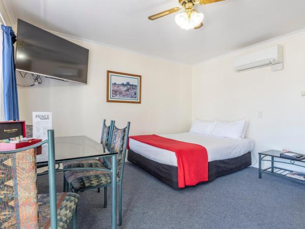 ASURE PRINCE motor lodge : photo 2 de la chambre suite 1 chambre familiale avec baignoire 