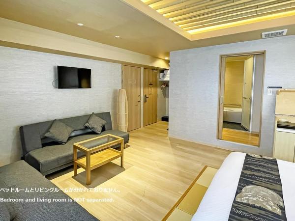 Stay SAKURA Tokyo Shinjuku Hyakukura : photo 3 de la chambre suite lit queen-size avec baignoire spa