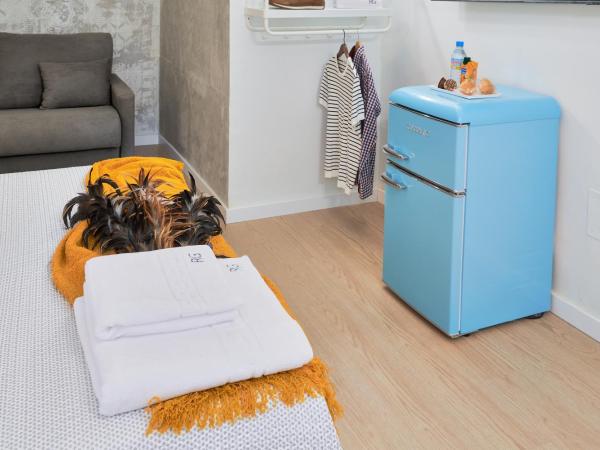 RG Duque de Aveiro auto check-in : photo 1 de la chambre chambre quadruple avec salle de bains privative