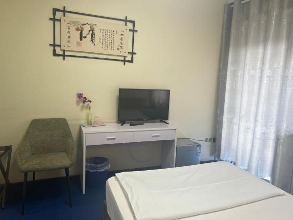 Hotel Am Flughafen : photo 1 de la chambre chambre simple