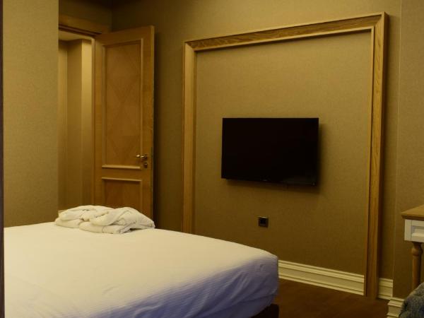 Bof Hotels Ceo Suites Atasehir : photo 4 de la chambre suite lit king-size