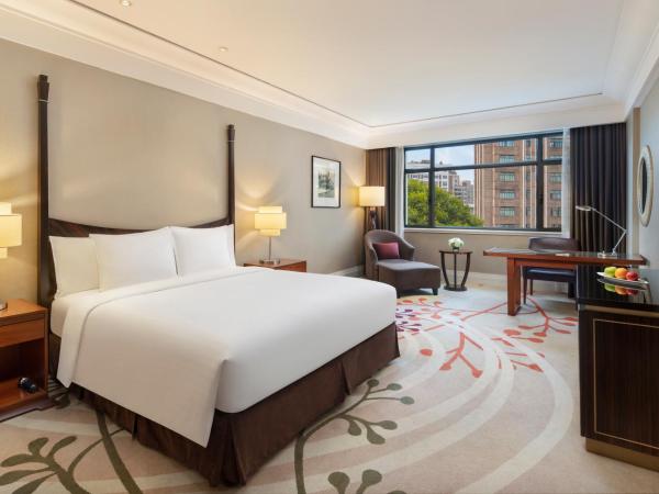 Jin Jiang Hotel : photo 1 de la chambre grande chambre deluxe lit king-size - cathay garden