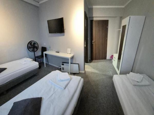 City Rooms Szczecin : photo 2 de la chambre chambre triple classique