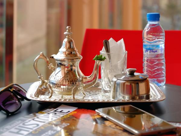 Appart Hôtel Mouna : photo 1 de la chambre appartement supérieur