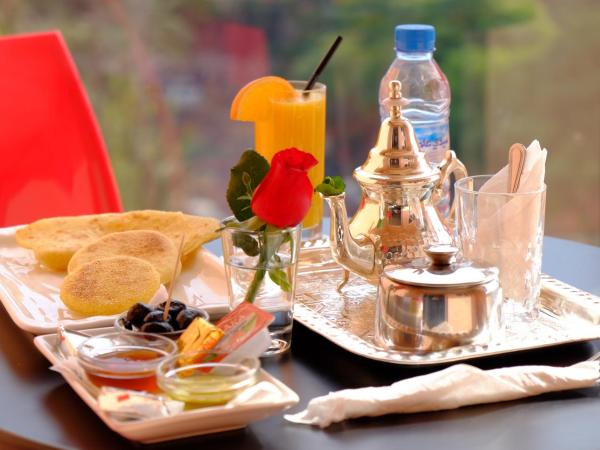 Appart Hôtel Mouna : photo 1 de la chambre appartement avec balcon