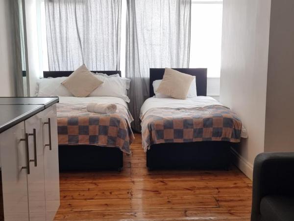 King's Cross Road Private Rooms : photo 6 de la chambre chambre triple confort