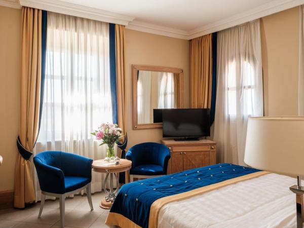 Villa Tolomei Hotel & Resort : photo 9 de la chambre chambre double classique