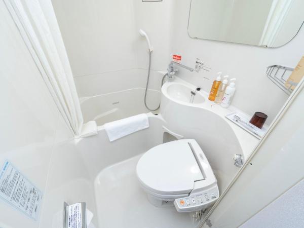 Super Hotel JR Shin-Osaka Higashiguchi : photo 1 de la chambre chambre simple - fumeurs