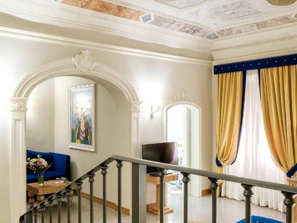 Villa Tolomei Hotel & Resort : photo 3 de la chambre suite royale