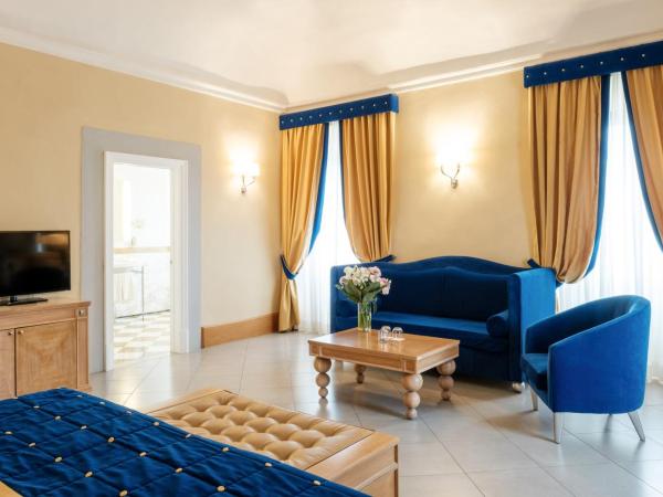 Villa Tolomei Hotel & Resort : photo 10 de la chambre chambre double deluxe