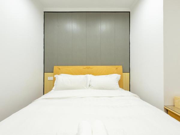 Qingdao Liuying Jieli Hotel - Qingdao Station Trestle Bridge Branch : photo 5 de la chambre petite chambre double