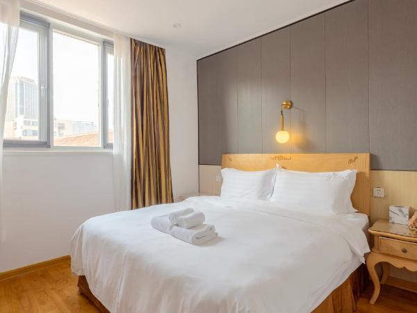 Qingdao Liuying Jieli Hotel - Qingdao Station Trestle Bridge Branch : photo 1 de la chambre chambre standard lit queen-size