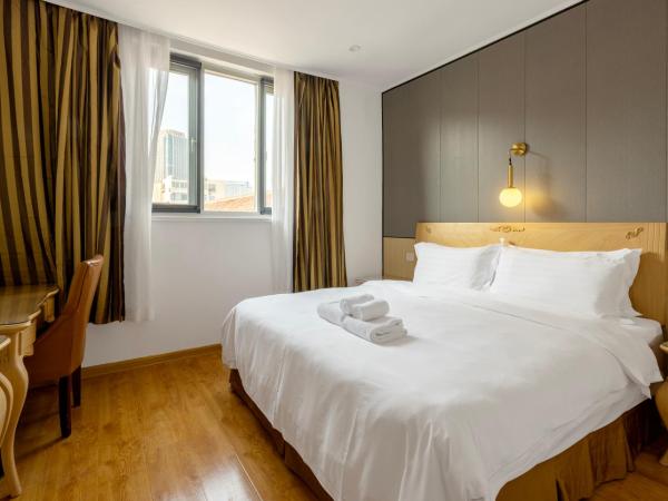 Qingdao Liuying Jieli Hotel - Qingdao Station Trestle Bridge Branch : photo 5 de la chambre chambre supérieure lit queen-size