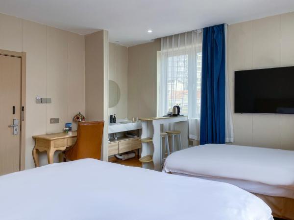 Qingdao Liuying Jieli Hotel - Qingdao Station Trestle Bridge Branch : photo 1 de la chambre chambre familiale