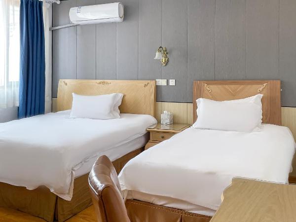 Qingdao Liuying Jieli Hotel - Qingdao Station Trestle Bridge Branch : photo 2 de la chambre chambre familiale