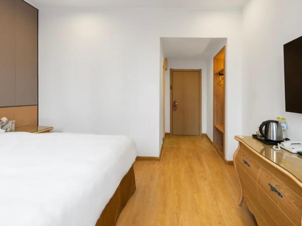 Qingdao Liuying Jieli Hotel - Qingdao Station Trestle Bridge Branch : photo 4 de la chambre chambre standard lit queen-size