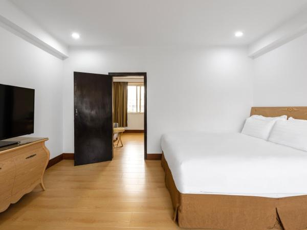 Qingdao Liuying Jieli Hotel - Qingdao Station Trestle Bridge Branch : photo 1 de la chambre suite 1 chambre