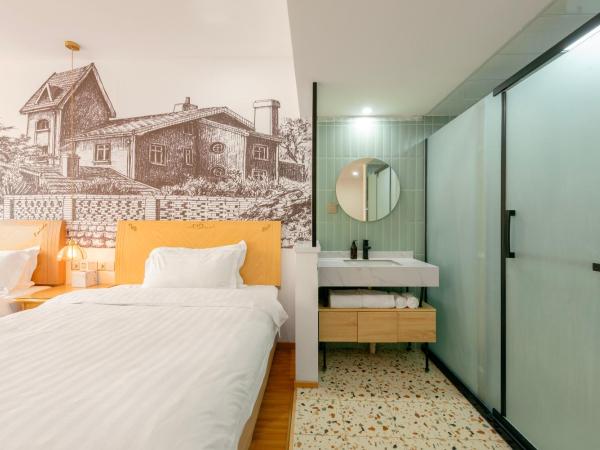 Qingdao Liuying Jieli Hotel - Qingdao Station Trestle Bridge Branch : photo 4 de la chambre chambre familiale supérieure