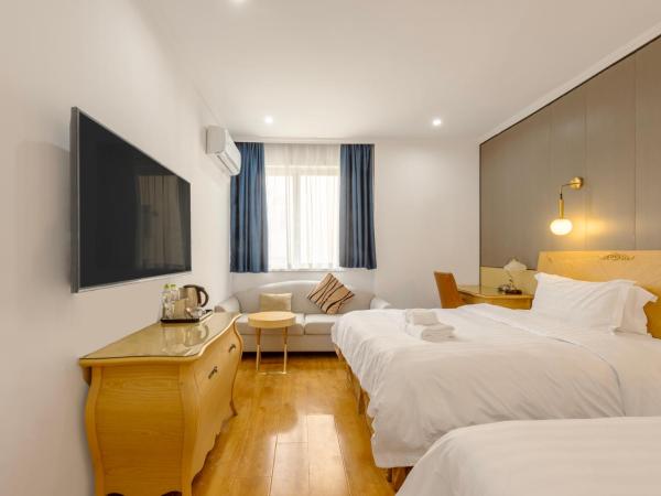 Qingdao Liuying Jieli Hotel - Qingdao Station Trestle Bridge Branch : photo 2 de la chambre chambre quadruple supérieure 