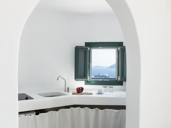 Spitia Santorini Villa Collection : photo 8 de la chambre maison troglodyte - vue sur coucher du soleil