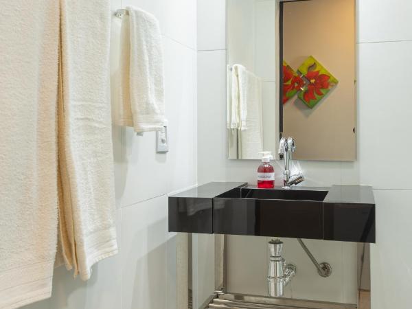 Califórnia Suítes : photo 4 de la chambre chambre lit queen-size deluxe