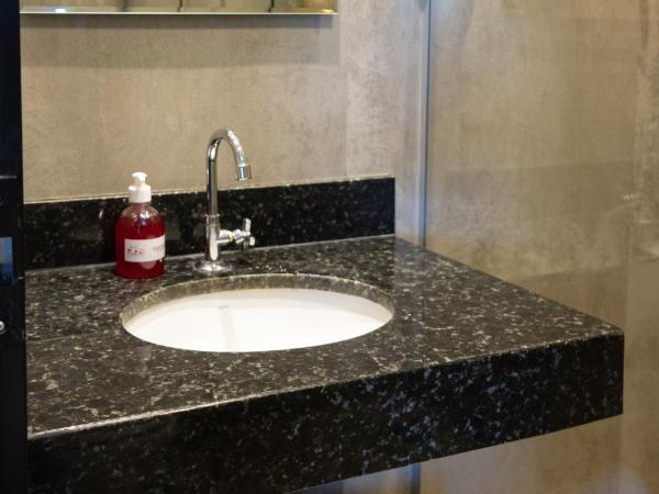 Califórnia Suítes : photo 3 de la chambre chambre familiale deluxe