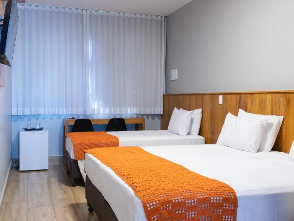 Califórnia Suítes : photo 2 de la chambre chambre triple de luxe