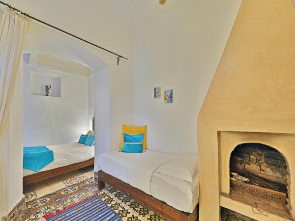 Riad Villa Garance : photo 6 de la chambre chambre triple confort avec douche