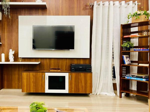 Vasudha : photo 3 de la chambre chambre double ou lits jumeaux avec salle de bains privative