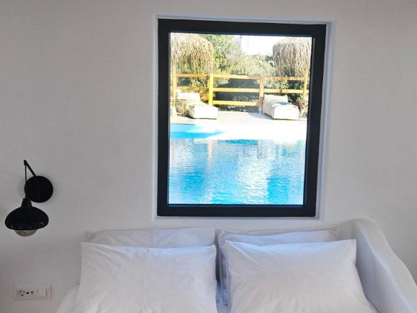 Elli Tropical Suites : photo 1 de la chambre suite deluxe - vue sur mer