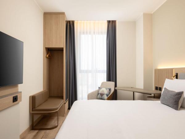 Courtyard by Marriott Milano Linate : photo 7 de la chambre chambre lit king-size standard