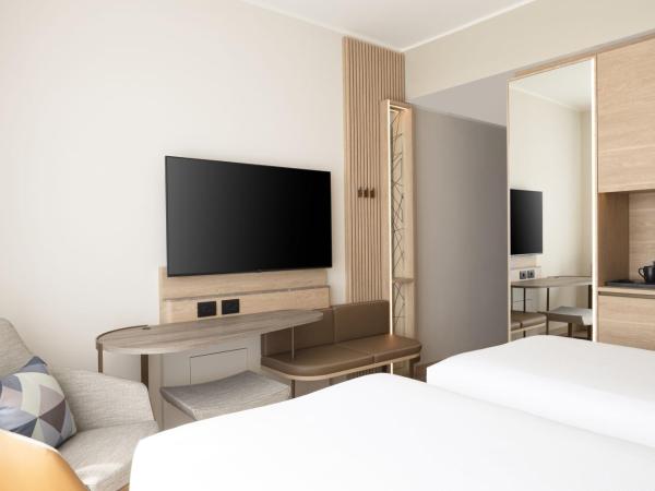 Courtyard by Marriott Milano Linate : photo 10 de la chambre chambre lits jumeaux standard