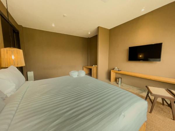 Historykan Kanchanaburi Hotel : photo 6 de la chambre chambre quadruple deluxe