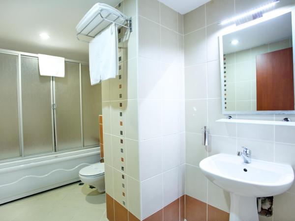 Budo Hotel : photo 9 de la chambre chambre triple