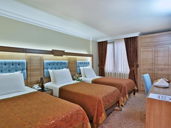 Budo Hotel : photo 3 de la chambre chambre triple