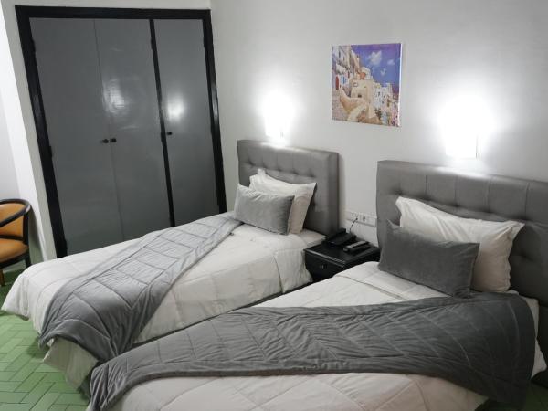 Hotel Nouzha : photo 2 de la chambre chambre lits jumeaux