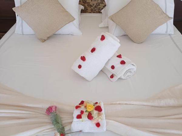 Villa Tunisienne : photo 8 de la chambre chambre lit queen-size deluxe