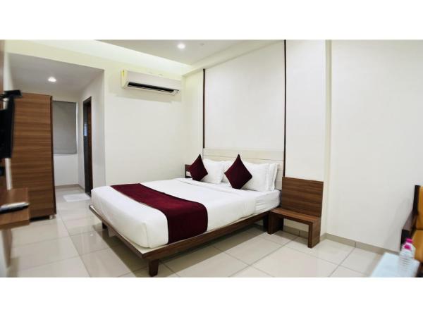 Hotel Ashray Inn Express : photo 5 de la chambre chambre lit king-size supérieure