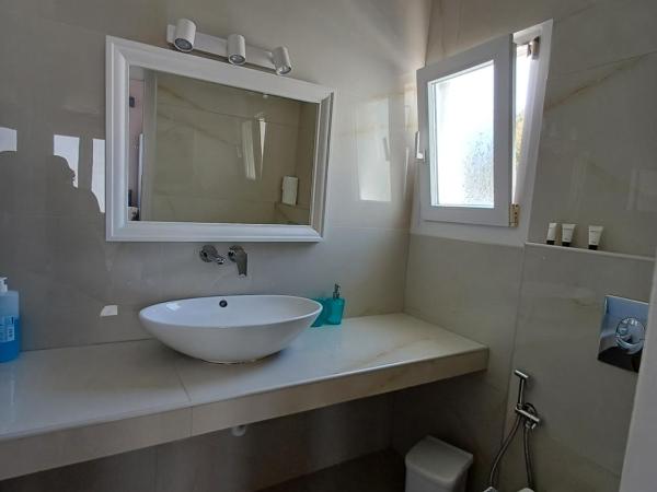 Manos Rooms : photo 6 de la chambre triple room with sea view