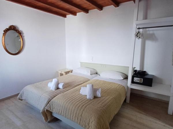 Manos Rooms : photo 2 de la chambre chambre triple